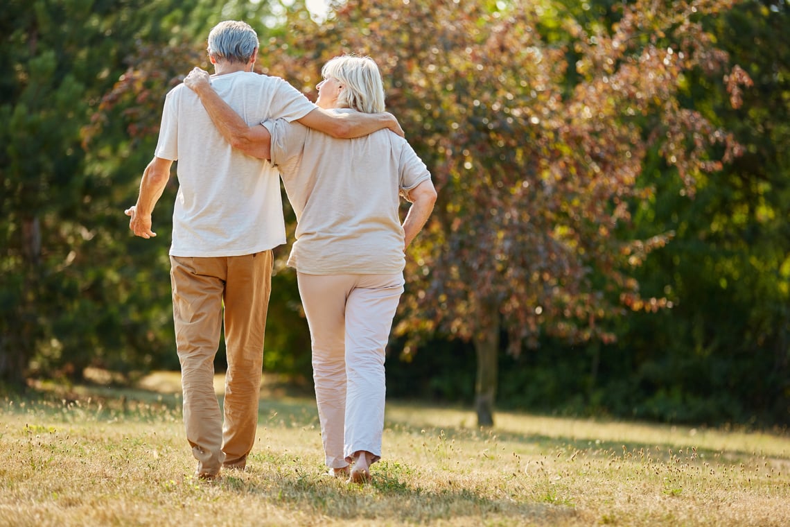 Two Seniors Go for a Walk in Summer